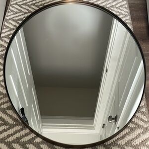 Oval wall mirror